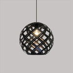 Black geometric pendant light above the table nz