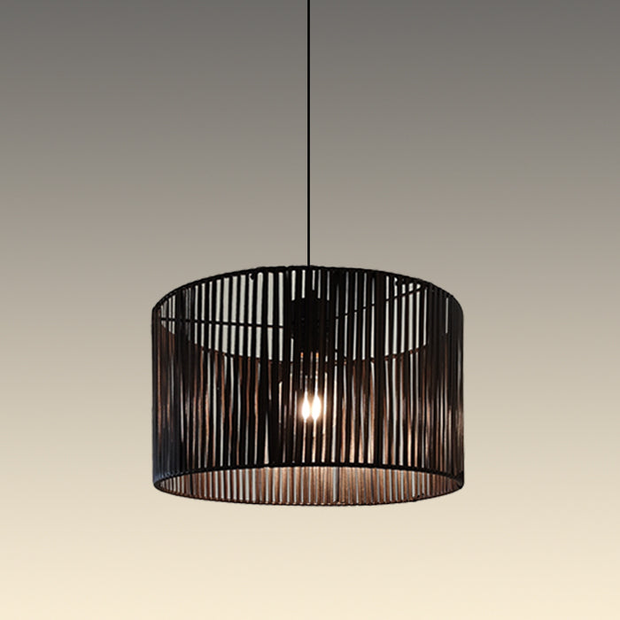 Black pendant light with a cylindrical design hanging in the room nz