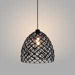 Black woven pendant light hanging in the stairscase area