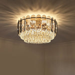 Chandelier with crystal details on a ceiling in the bedroon nz