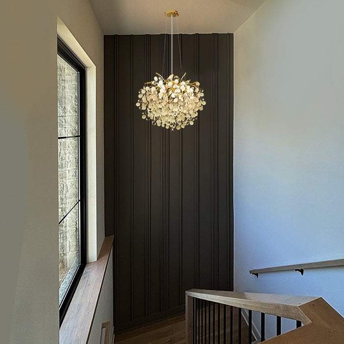 Chandelier hanging in the staircase area nz houses