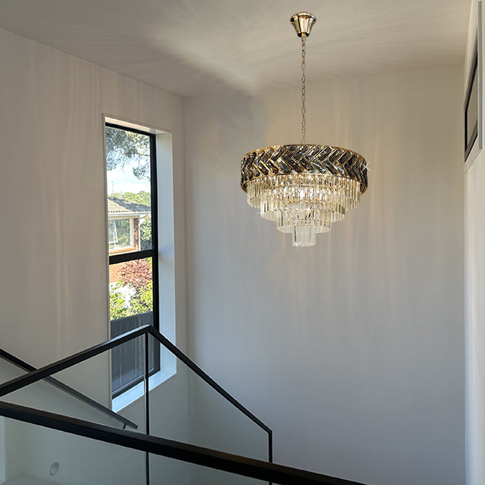 Chandelier hanging in the staircase area auckland houses