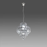 Chandelier with crystal accents above the nz homes table