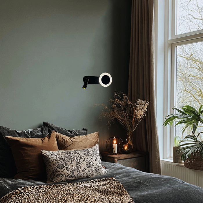 Cozy bedroom with wall lamp near a window nz homes