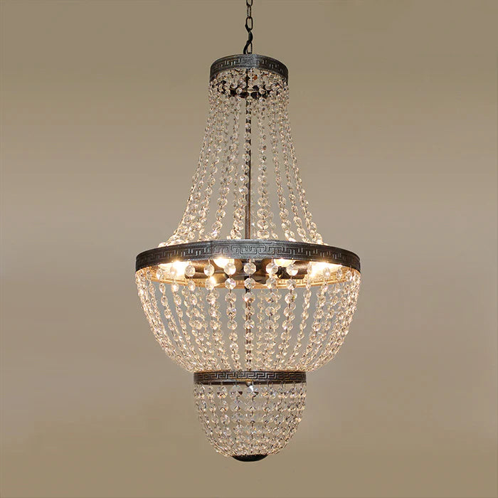 Crystal chandelier hanging against a beige above table nz