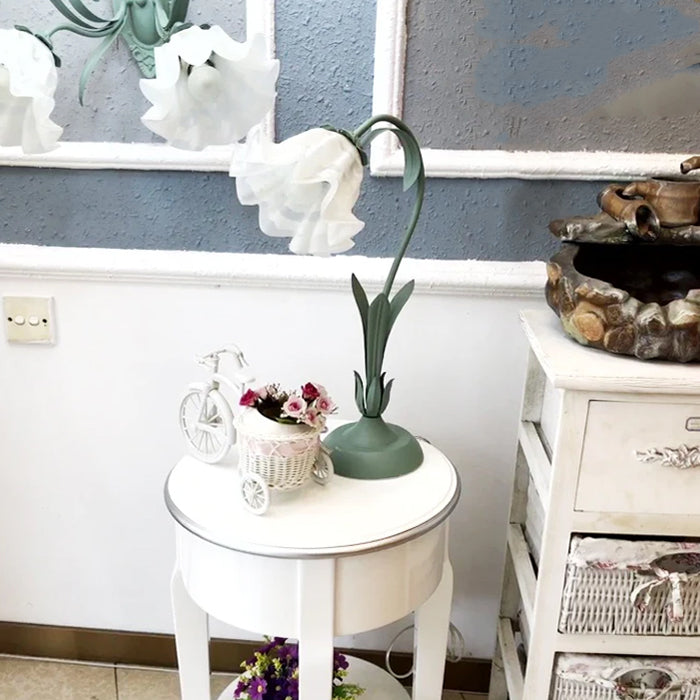 Decorative flower lamp on a small round table west auckland