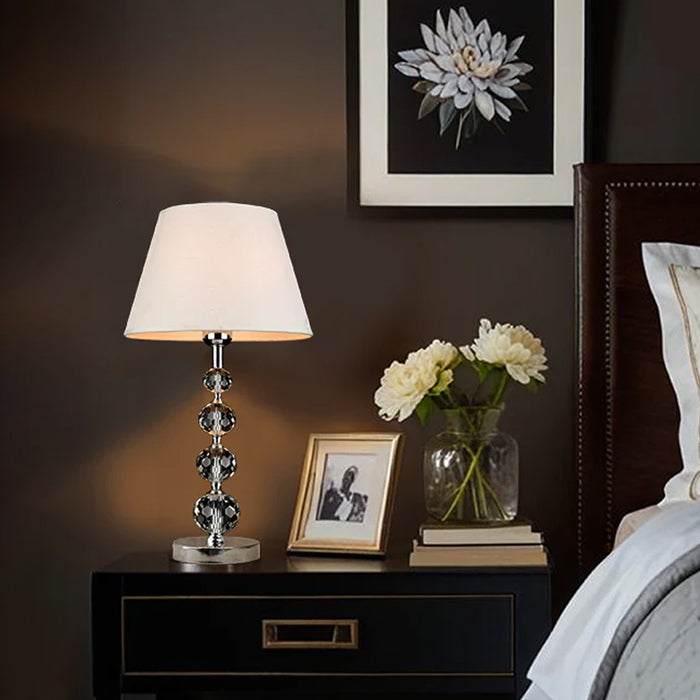 Decorative table lamp on a nightstand  in a bedroom NZ