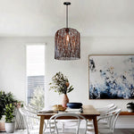 Dining room with  a modern wave pendant shade light nz house