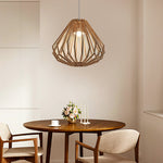 Dining room with a wooden modern pendant light NZ