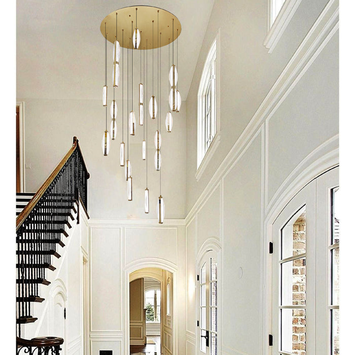 Elegant staircase with modern pendant lights in a well-lit hallway.