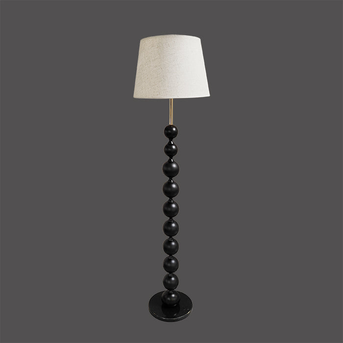 Floor lamp with a black spherical base in Livingroom