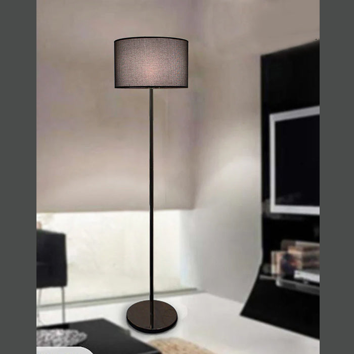 Floor lamp with a black shade in a room auckland