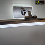 Metallic light fixture with a reflective surface, branded 'Eden Lighting' nz