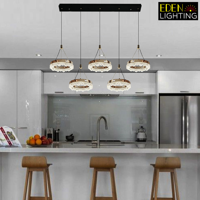 Modern LED pendant lamp above kitchen island interior design NZ