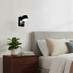Modern bedroom with a bedside wall-mounted light fixture nz