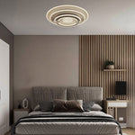 Modern bedroom with a ceiling light fixture auckland homes
