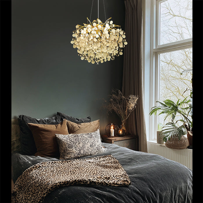 Modern bedroom with a gold crystal chandelier auckland