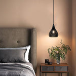 Modern bedroom with black pendant light auckland