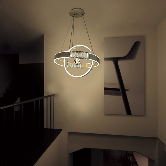Modern chandelier hanging in staircase NZ