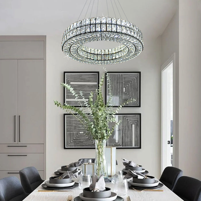 Modern dining room with a crystal chandelier auckland