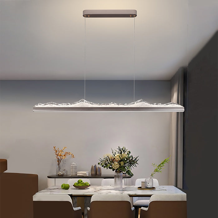 Modern dining room with a long pendant light fixture west auckland