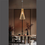 Modern dining room with wooden hanging light above the table nz