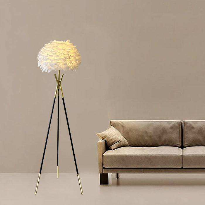 Modern tripod floor lamp with a beige lampshade in livingroom auckland