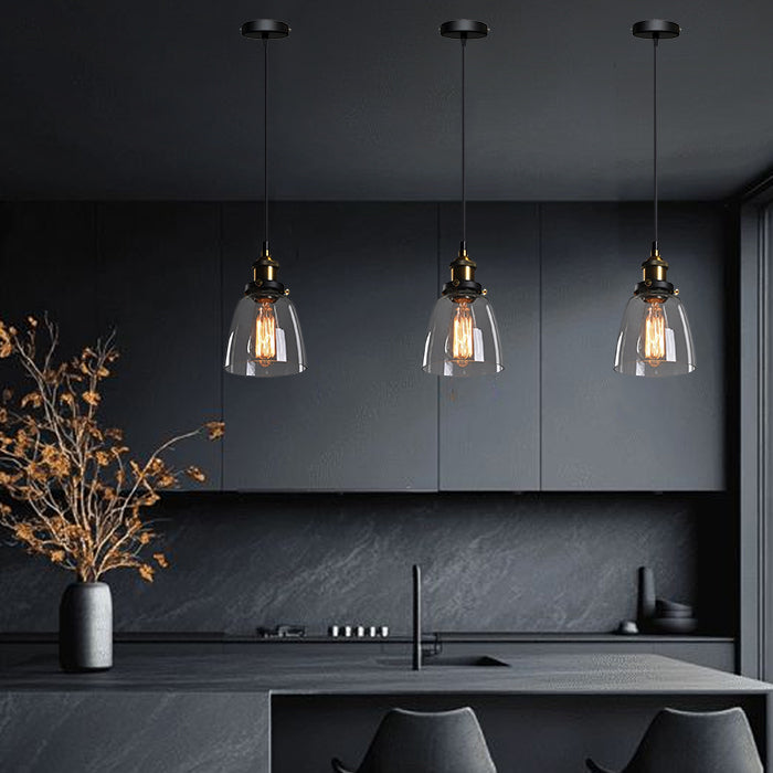 Modern kitchen with three pendant lights hanging above a countertop nz