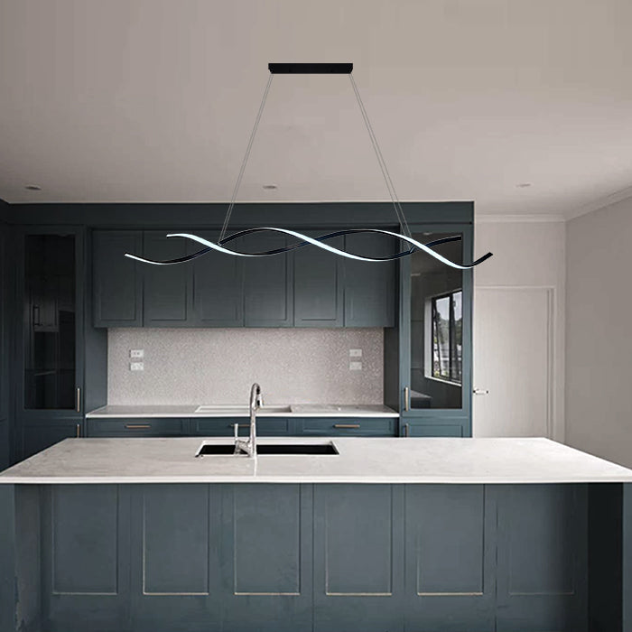 Modern kitchen with a hanging light fixture above a countertop nz