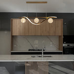 Modern kitchen with a decorative brass led pendant light auckland