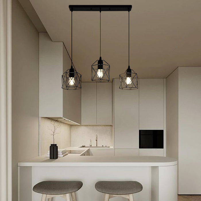 Modern kitchen with pendant lights over a small island auckland
