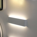 Modern wall-mounted light fixture on a neutral wall west auckland