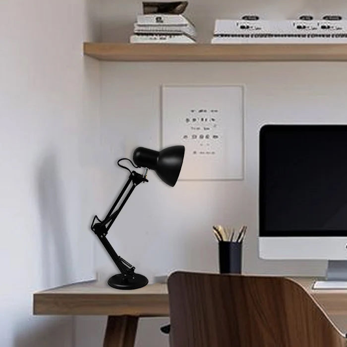 Modern office desk setup with a black adjustable lamp west auckland