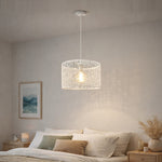 Modern pendant light hanging above a bed in a bedroom nz