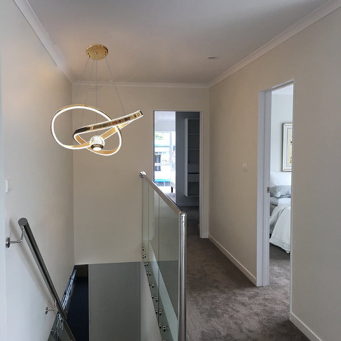 Modern staircase with a stylish light fixture in a home interior auckland