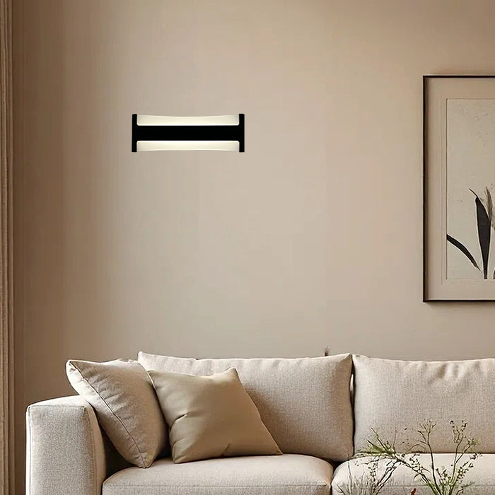 Modern wall light fixture on a beige wall west auckland