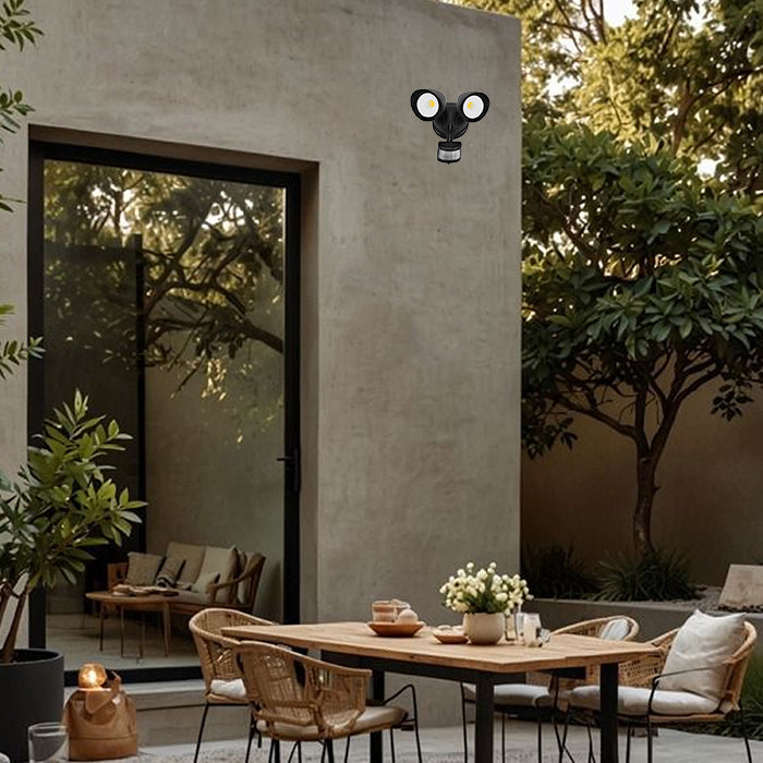 Outdoor patio setting with wall-mounted light fixture auckland