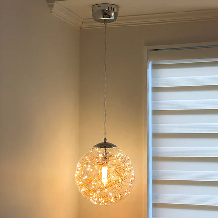 Pendant light with decorative glass shade in a bedroom west auckland
