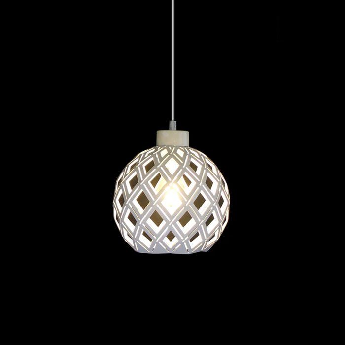 Pendant light with geometric design above table nz