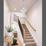 Staircase with a decorative chandelier nz homes