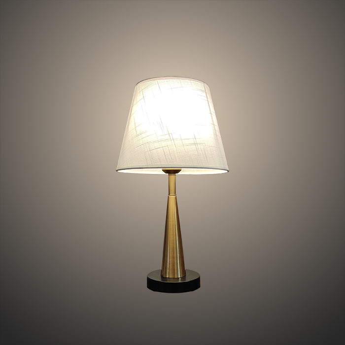 Table lamp with a white shade and gold base NZ