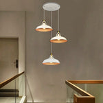 Three pendant lights hanging in a modern interior setting west auckland