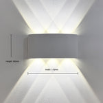 Wall-mounted light fixture on a textured white wall with dimensions nz