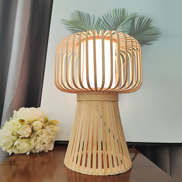 Wooden table lamp with a warm glow on a surface west auckland