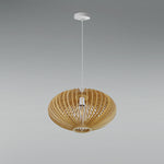 Woven rattan pendant light hanging on the entry area nz