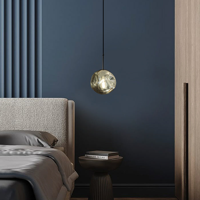 Modern bedroom with small glass pendant light