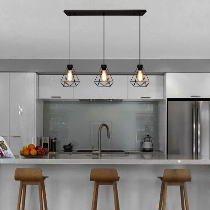 Modern kitchen with pendant lights, bar stools, and a stainless steel refrigerator AUckland