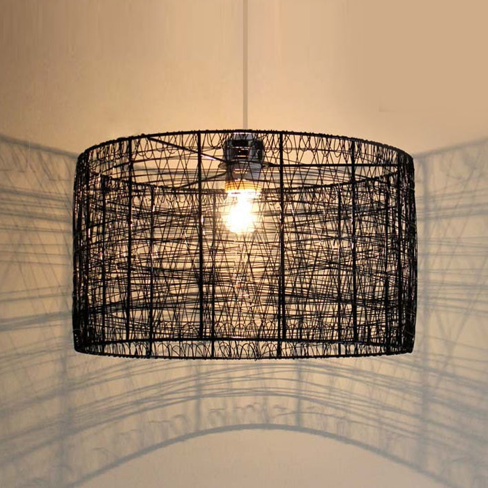 A black iron string pendant light shade hanging from a ceiling chain nz