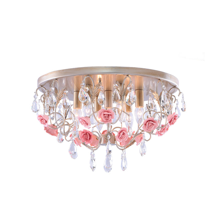 A brass-colored ceiling light fixture with clear crystals and pink ceramic flowers NZ