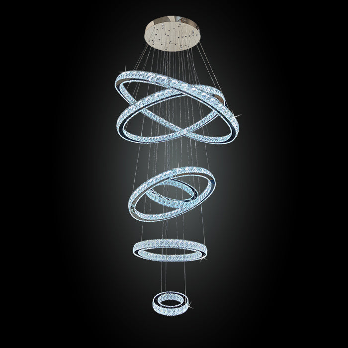 A contemporary chrome chandelier with multiple circular rings and clear crystal-like pendants auckland